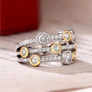 Silver and Gold Round Stone Ring